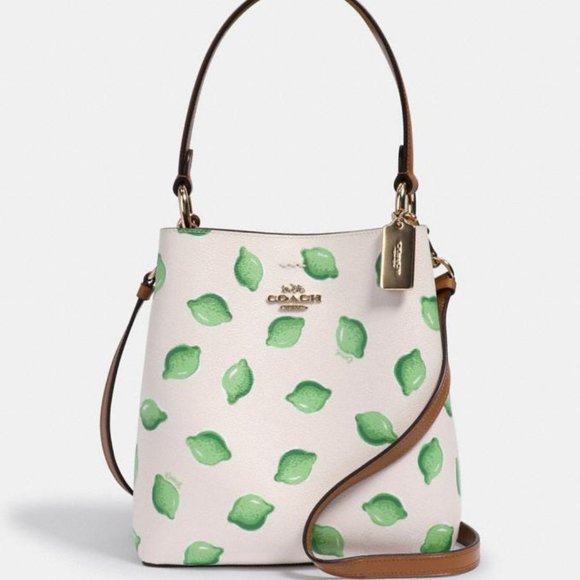 COACH Handbags - NWT COACH SM BUCKET BAG LIME PRINT